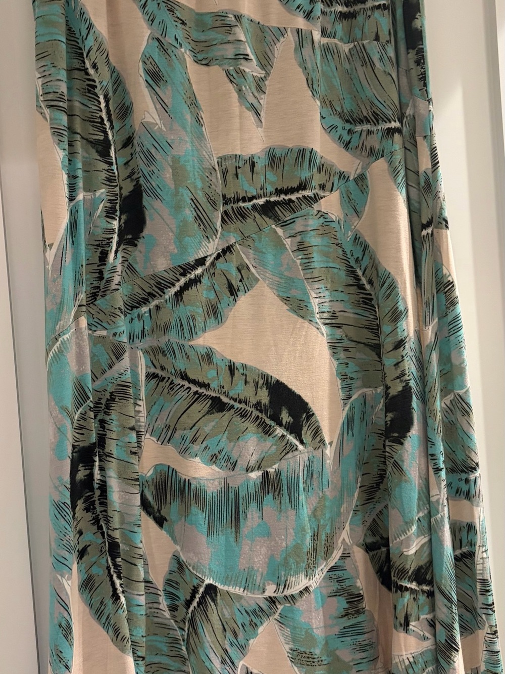 Karen Kane Cream Colored Asymmetric Hem Maxi Skirt with Teal & Black Leaf Print